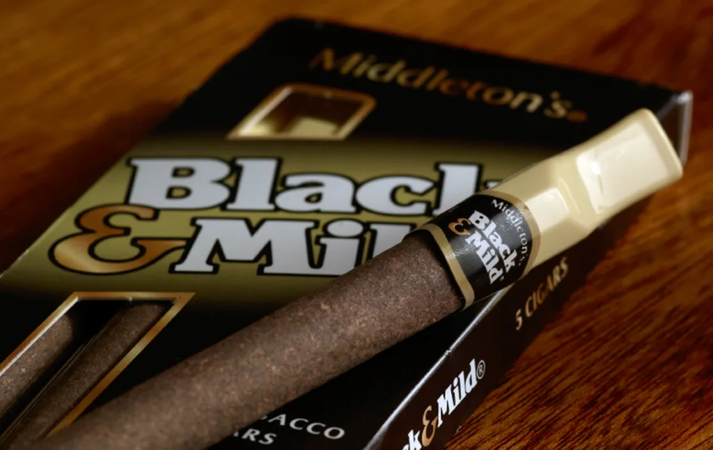 black and mild cigar smoking 1678691267