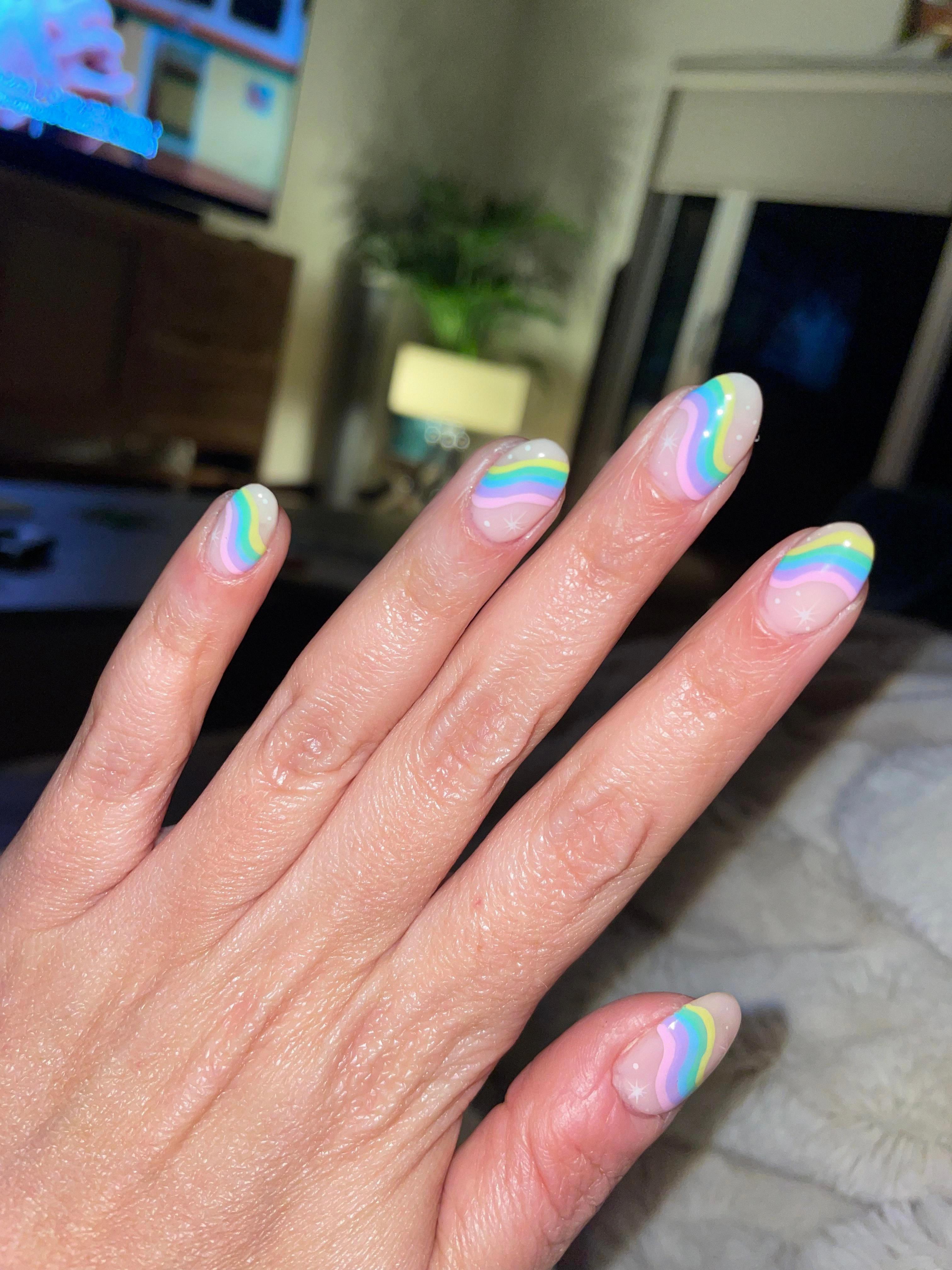 different color nails on each finger