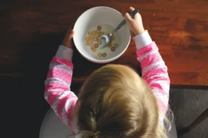 child eating with a spoon 1689999850