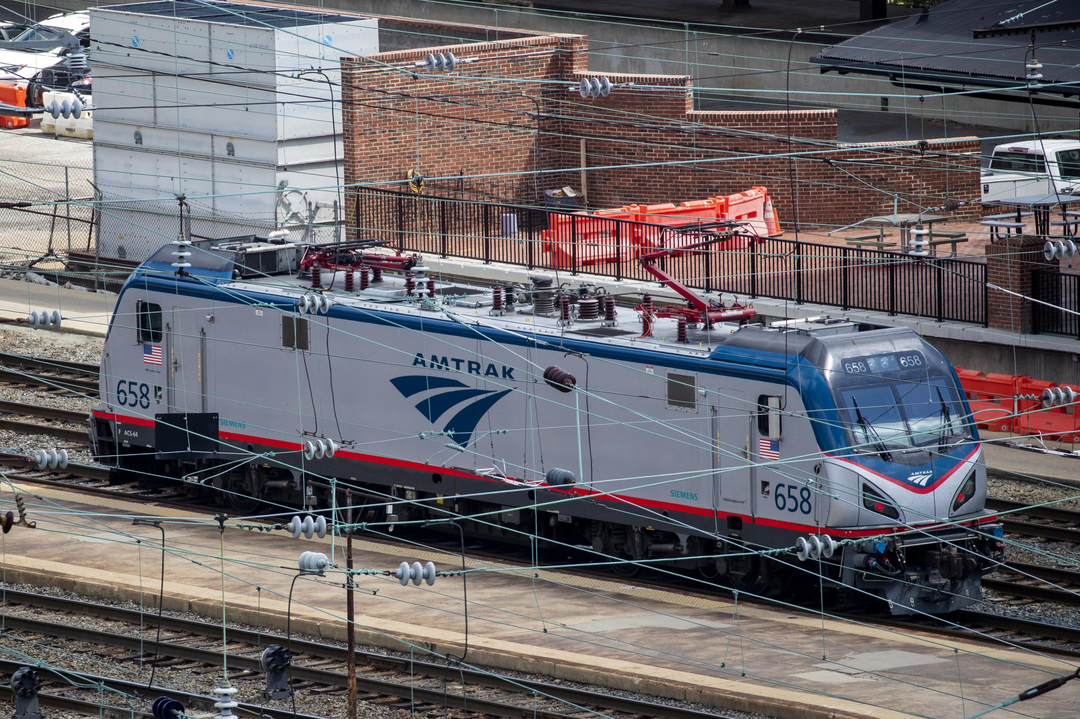 who owns amtrak